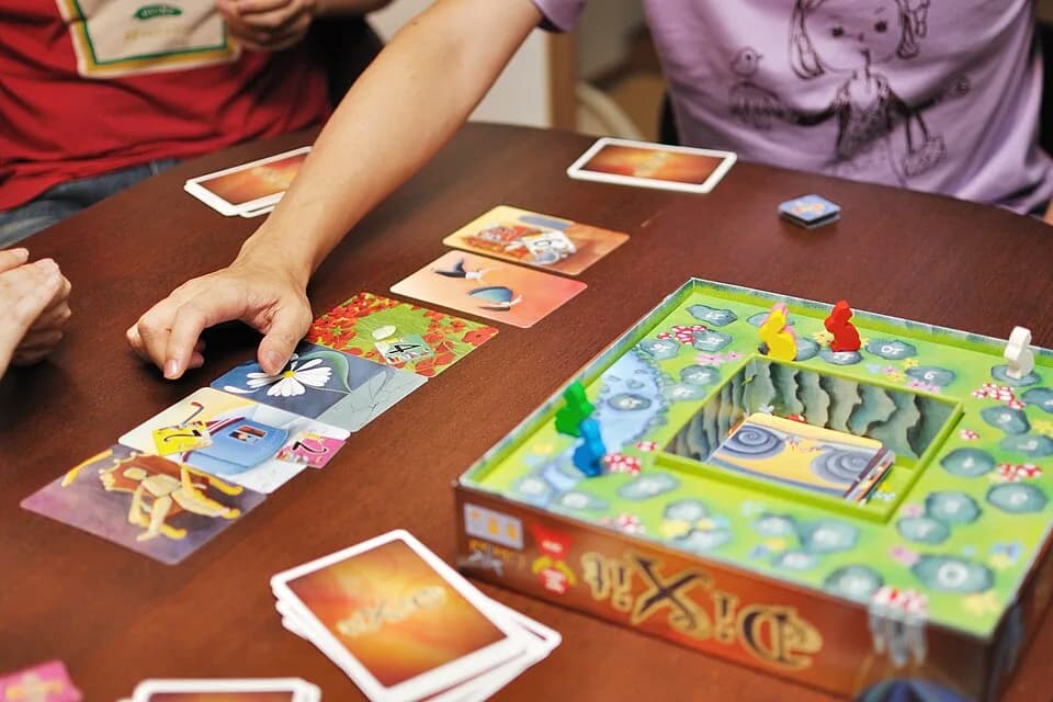 #6 Dixit — Top 10 Family Board Games That Adults Actually Enjoy Too