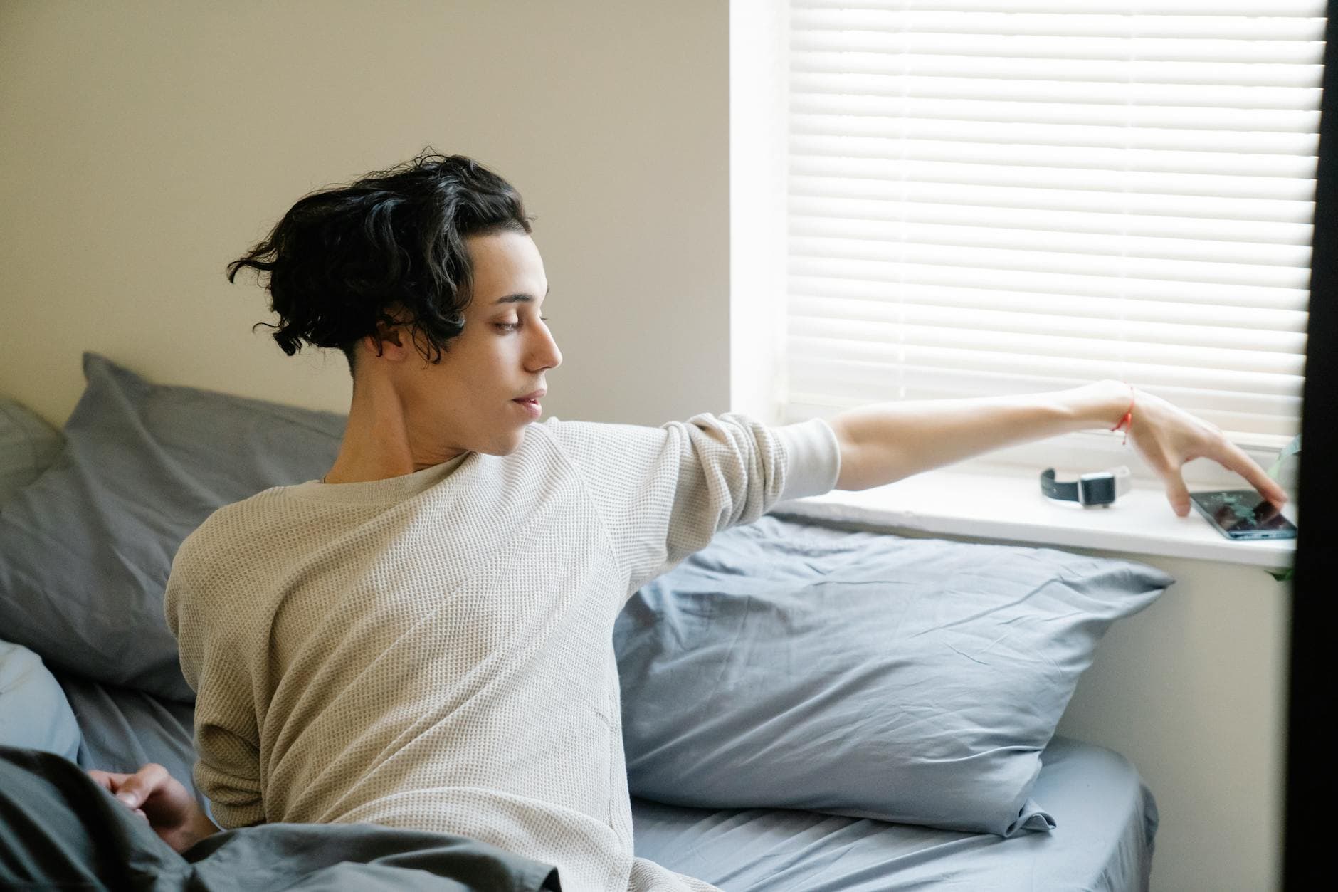 #4 Phone Checking Within 60 Seconds of Waking — Top 10 Worst Social Media Habits You Probably Do Every Day