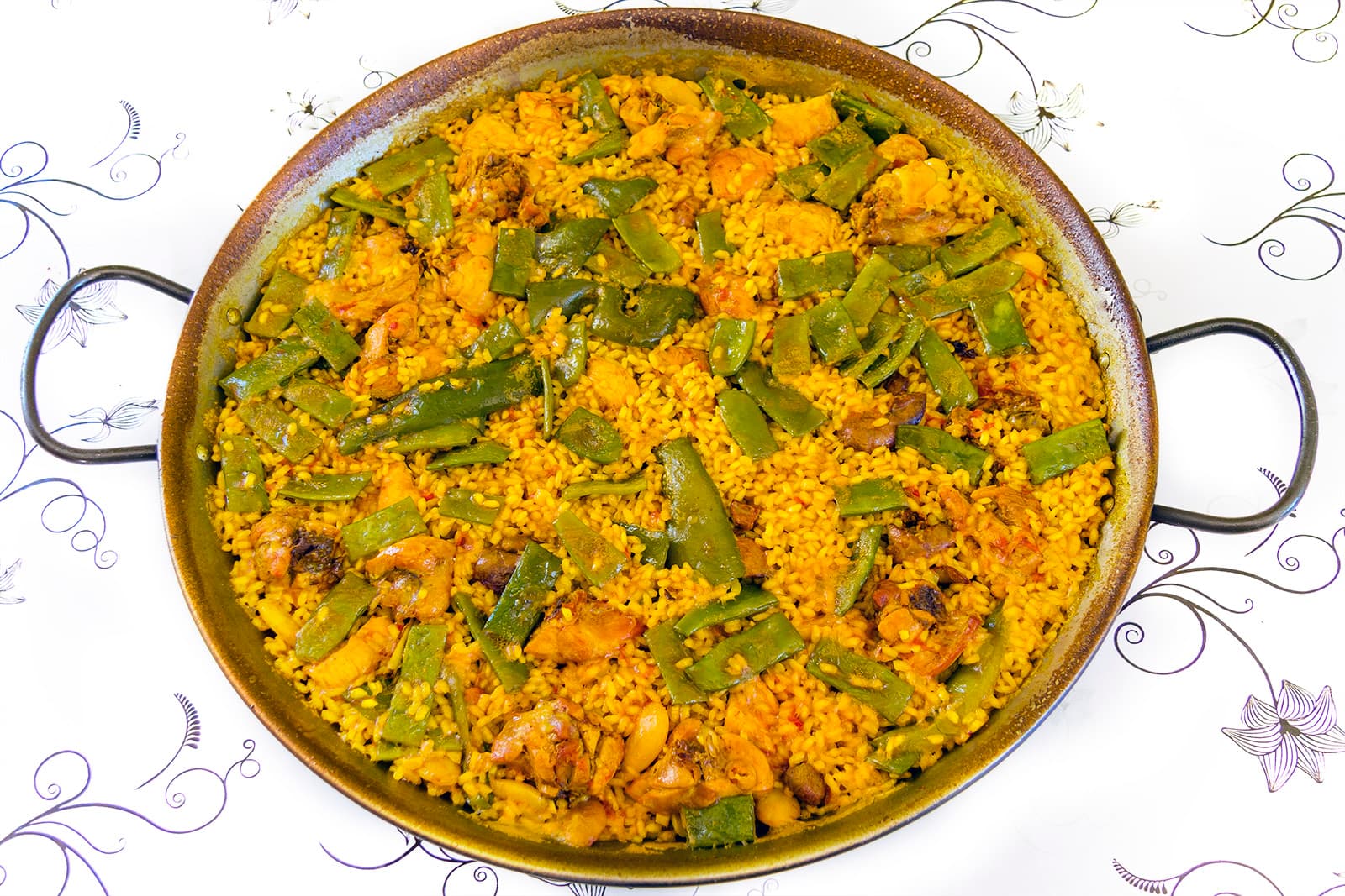 #1 Paella Valenciana — Top 10 Iconic Spanish Food Dishes