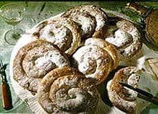 #7 Ensaimada — Top 10 Spanish Desserts to Try in 2026 (Churros, Flan, Tarta de Santiago & More)
