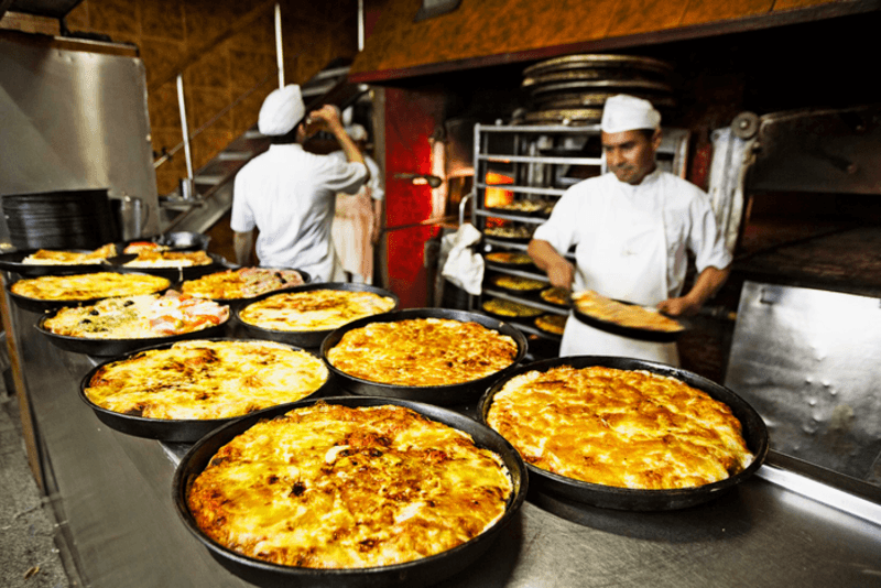 #6 Fugazzeta Slice — Top 10 Best Argentine Street Foods to Try in 2026