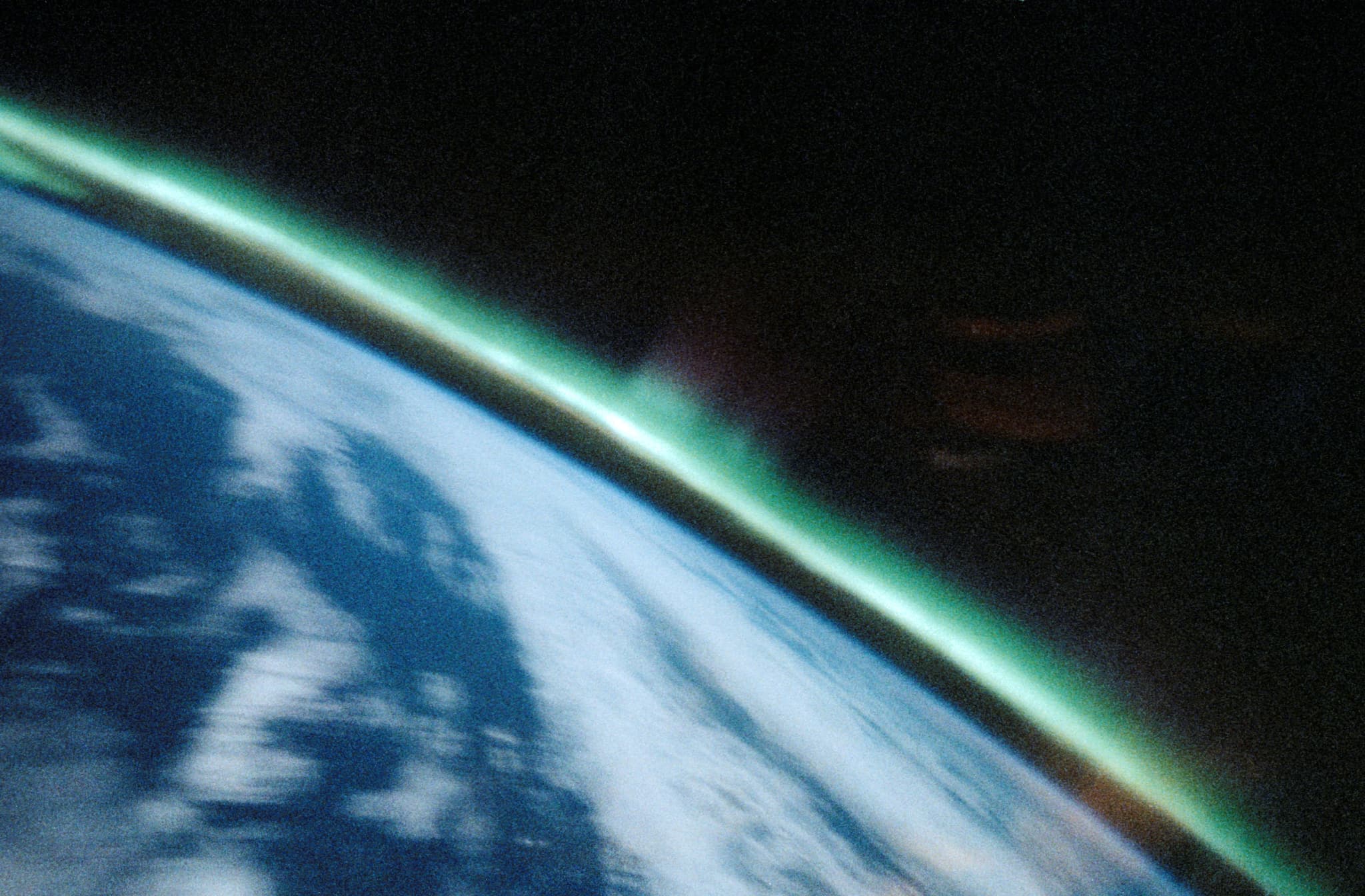 #3 Aurora Australis — Spiked, Sinuous Green Airglow — Home, Seen From Above: Earth's Most Breathtaking Views from Space