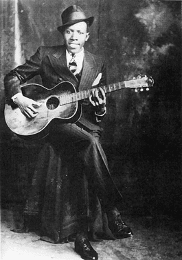 #7 Robert Johnson — Top 10 Best Guitarists of All Time