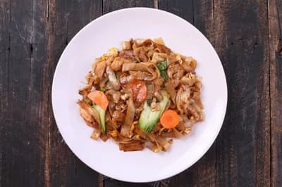 #5 Pad See Ew from Wok Hei Stalls — Top 10 Thailand Street Food Experiences in 2026